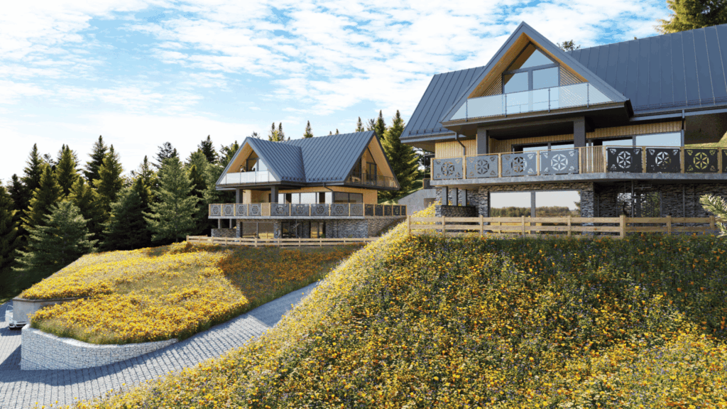 Nowoczesny budynek z dużymi przeszkleniami w otoczeniu natury.