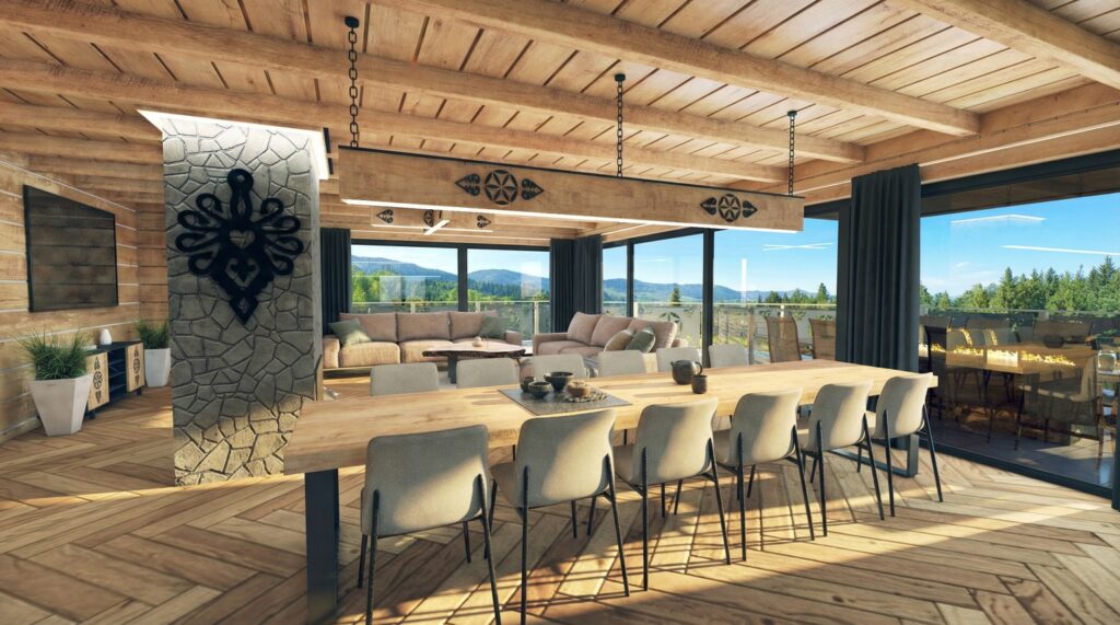 Wnętrze jadalni z drewnianym sufitem i dużymi przeszkleniami na taras.